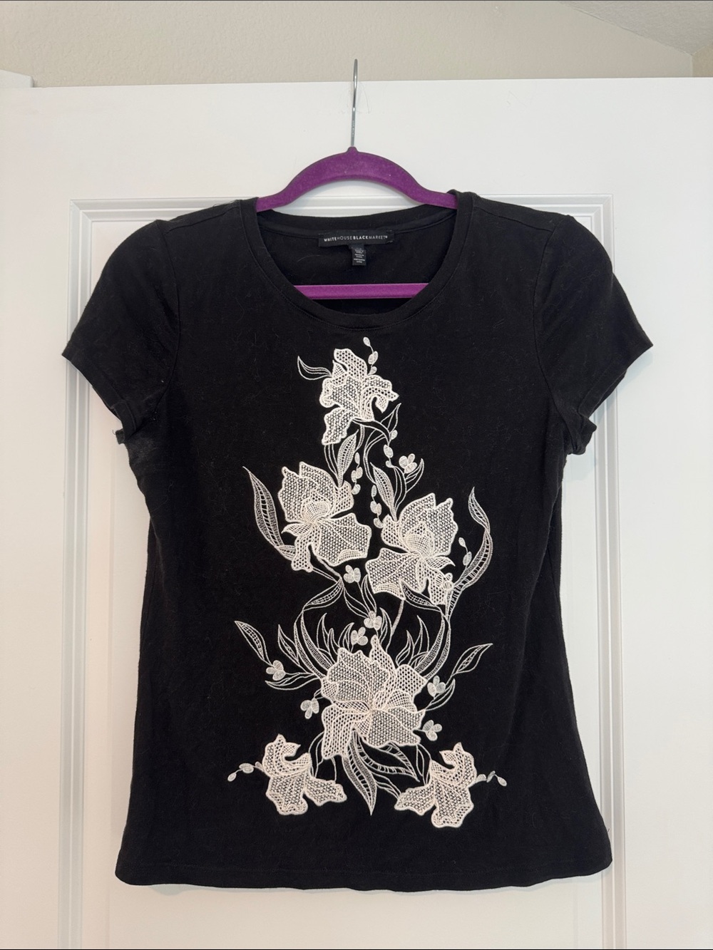 White House Black Market Black Tee with White Floral Lace Appliqué
